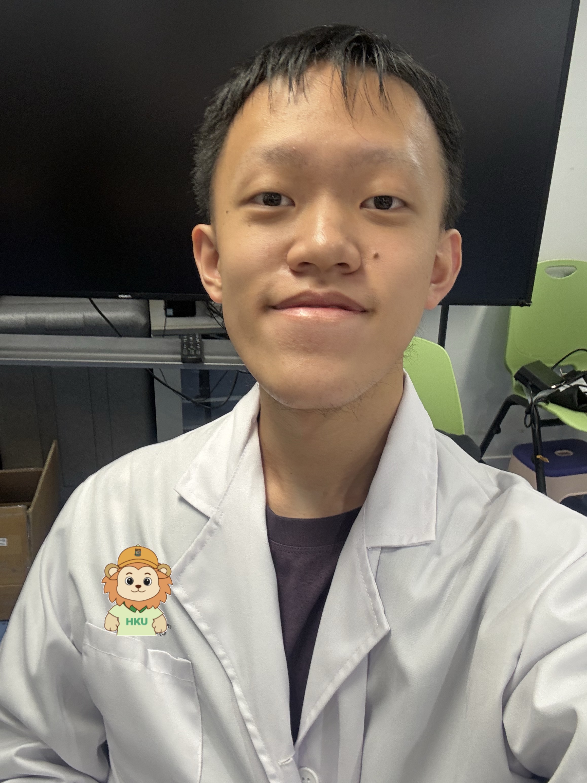 Tsz Pi Liu in the RoboCPS Lab